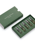 Laboratory Perfumes Lifestyle Set (5 x 5 ml) with box cover to the side, showing bottles inside the box