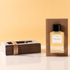 Essential Parfums Orange X Santal Perfume by Natalie Gracia Cetto - Refillable - product shown next to packaging.