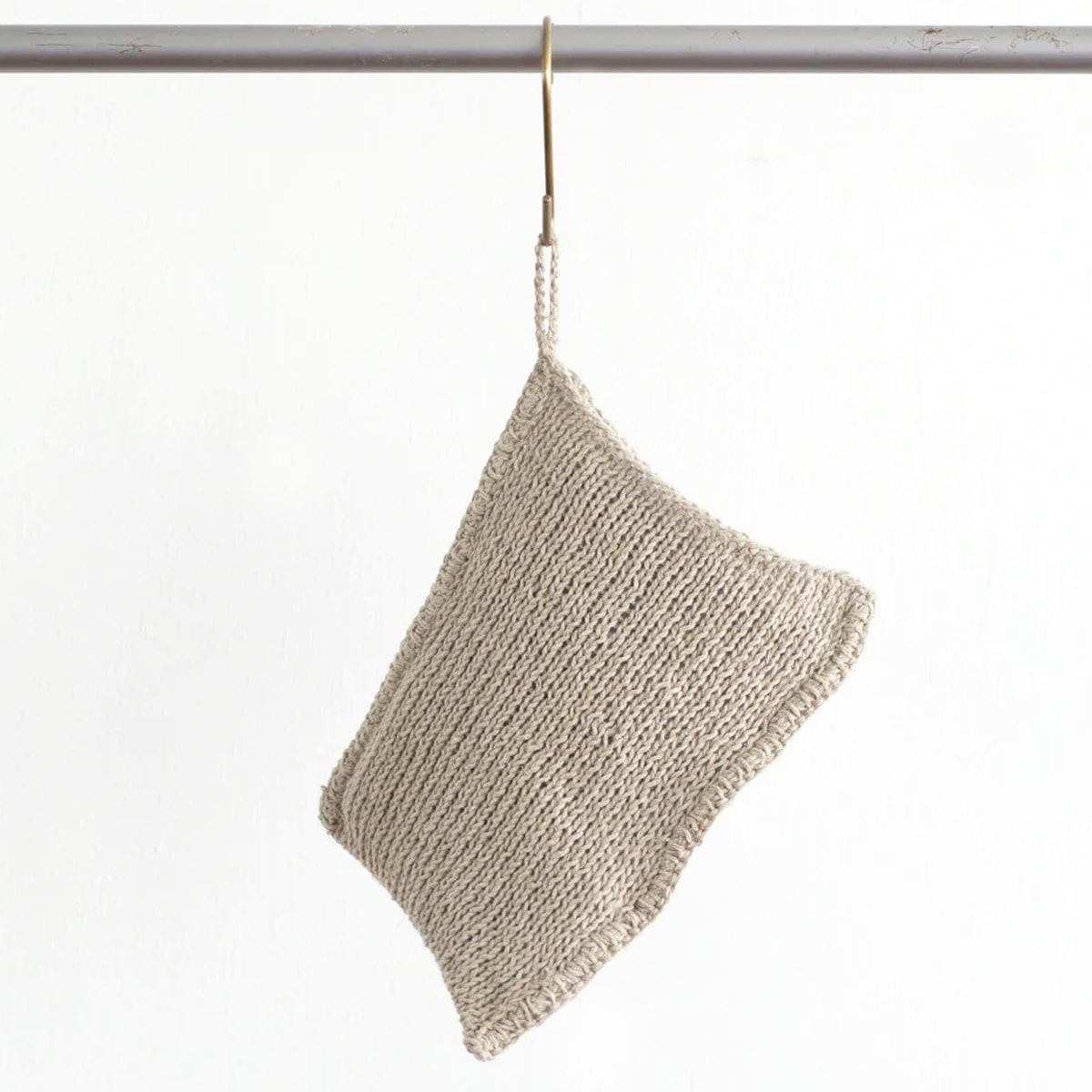 Fog Linen Work Linen Knit Wash Cloth (1 pc) shown hanging by its loop from rod