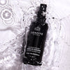 Lifestyle shot of Odacite Montana Harvest Omega Oil Cleanser (100 ml) in water