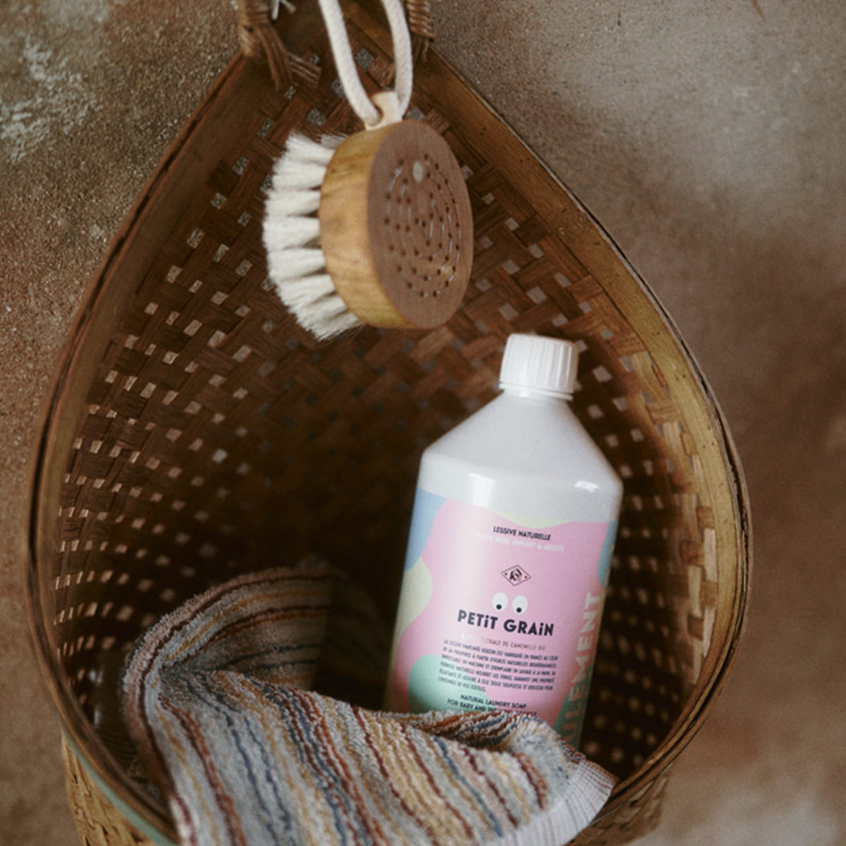 Kerzon Laundry Soap - Petit Grain (1 L) - product shown in basket. 