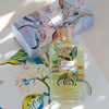 Fragonard Parfumeur Belle d'Arles Eau de Toilette (100 ml) with box on a floral illustration