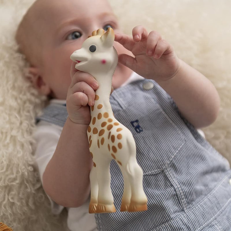 Sophie La Girafe Fresh Touch Sophie La Girafe shown in baby&#39;s hands and mouth