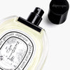Diptyque L'Eau de Neroli Eau de Toilette (100 ml) - product shown laying flat with lid off.