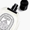 Diptyque Geranium Odorata Eau de Toilette (100 ml) - product shown laying on counter with lid off. 
