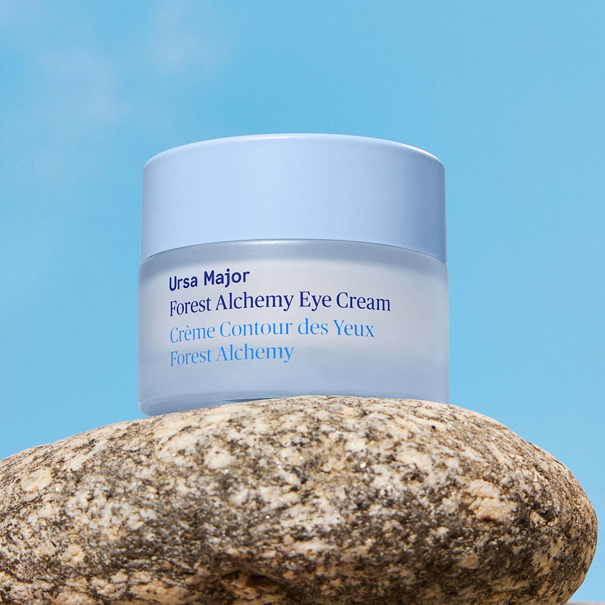 Ursa Major Forest Alchemy Eye Cream (0.5 oz) - product on top of rock