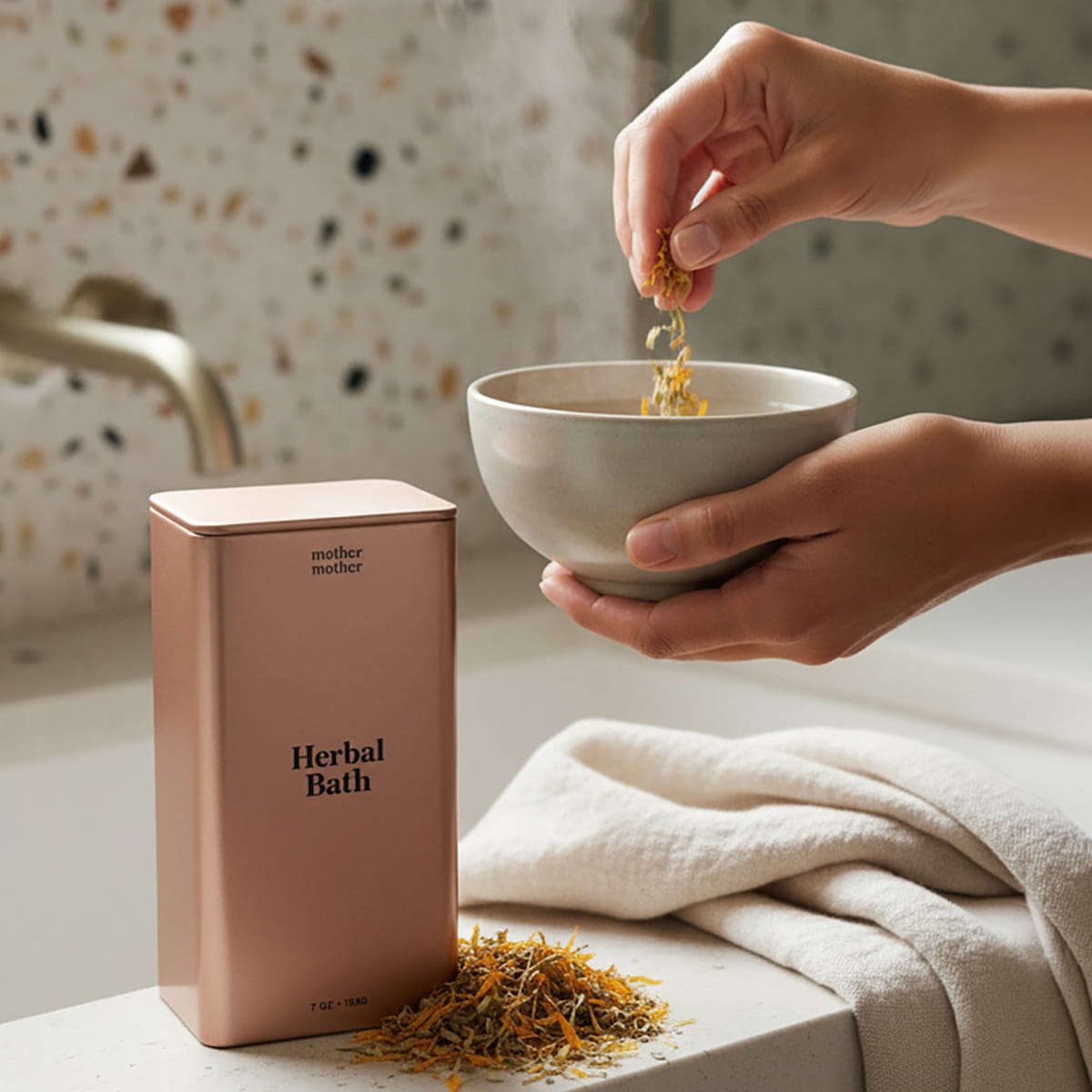 Mother Mother Organic Herbal Bath (10 oz) - product shown being put into white bowl next to bath tub.