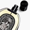 Diptyque Eau Rose De Parfum (75 ml) - product shown on back with lid off.
