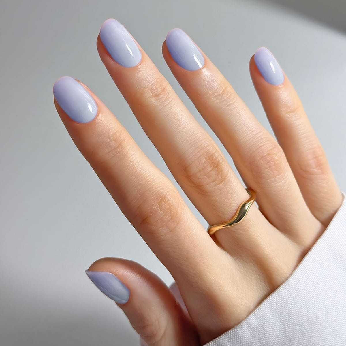Close up of model wearing Kure Bazaar Nail Laquer ‚Äì Papillon