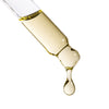 Augustinus Bader The Hair Oil (30 ml) - close up of dropper with product liquid dripping out