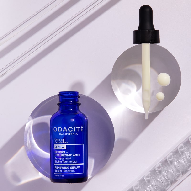 Lifestyle shot of Odacite Retinol + Hyaluronic Acid Renewing Serum showing bottle and dropper  side by side