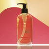 Lifestyle shot of Eau d'Italie Pomegranate & Freesia Liquid Soap (300 ml) with red and yellow paper in the background