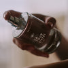 Kerzon Fragranced Mist - La Tour Eiffel (100 ml) - product shown being held. 