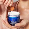 Augustinus Bader The Face Cream Mask (50 ml) - model shown shown using applicator to scoop product
