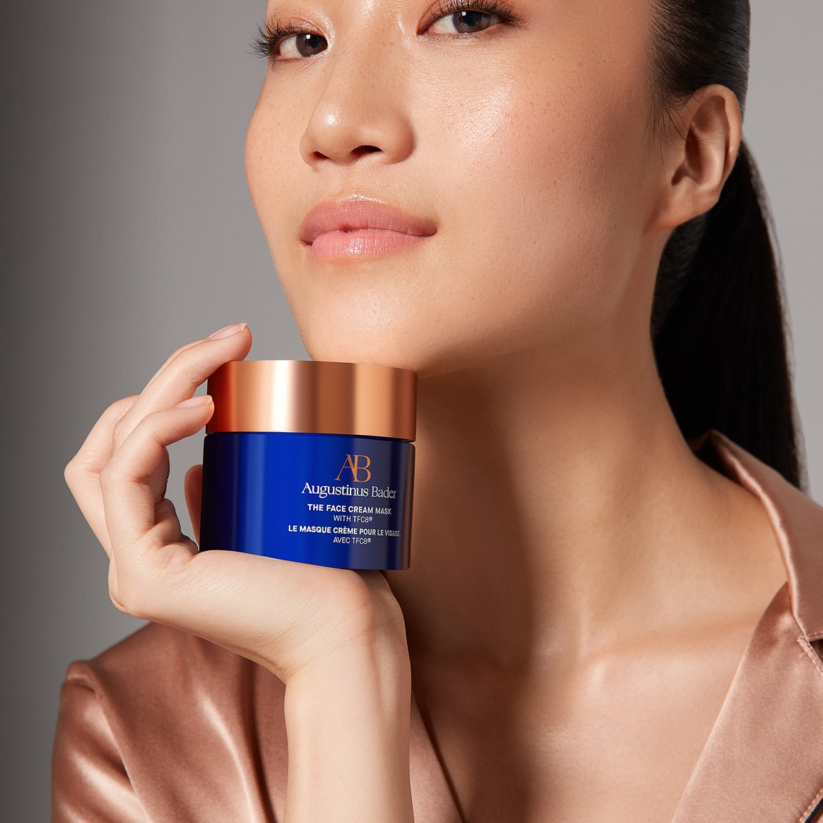 Augustinus Bader The Face Cream Mask (50 ml) - model shown holding product