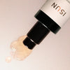 Close up of ISUN Sunstone Cleanse Facial Cleaner (100 ml) bottle showing product swatch