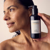 Vintner's Daughter Active Renewal Cleanser (115 ml) - product shown being held by model.