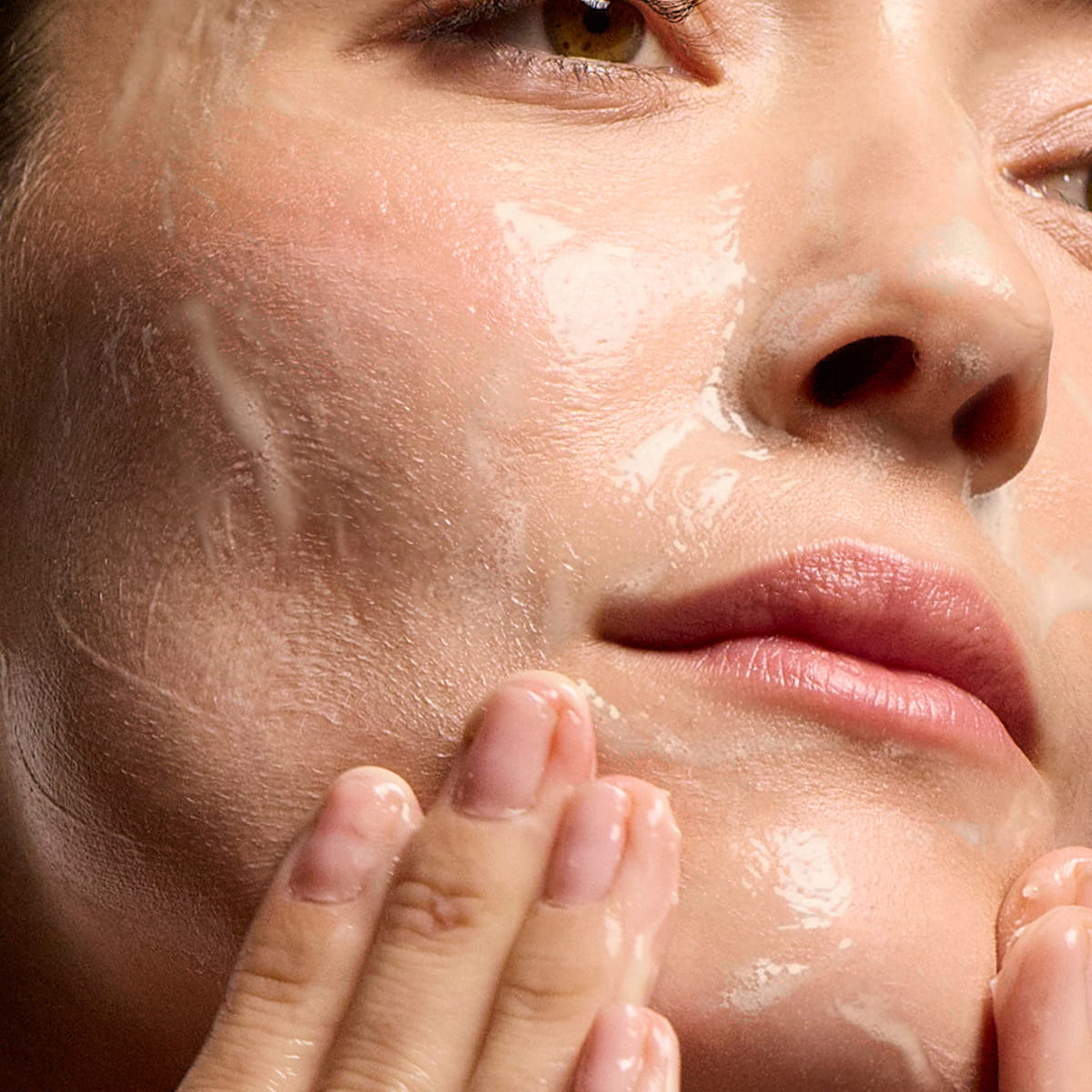 Vintner's Daughter Active Renewal Cleanser (115 ml) - product shown being applied on face.