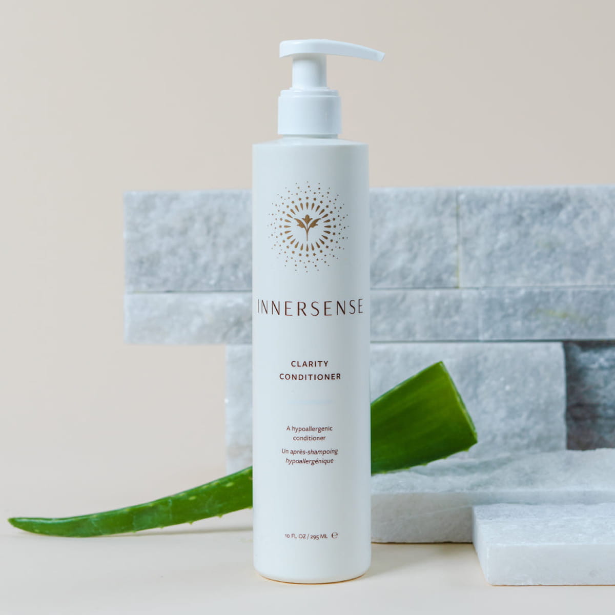 Innersense Organic Beauty Clarity Conditioner (10 oz) - product shown on creme background.
