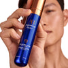 Augustinus Bader The Retinol Serum (30 ml) - model shown holding product