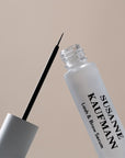 Susanne Kaufmann Lash & Brow Serum (5 ml) shown open with wand showing brush tip