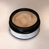 ISUN Crystal Cleansing Exfoliant (100 ml) with lid off to show color and texture of product inside