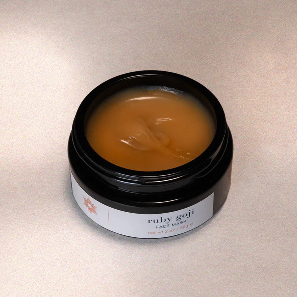 ISUN Ruby Goji Face Mask (58 g) with lid off showing color and texture of mask inside