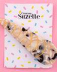 Coucou Suzette Seashell Hair Clip - Product displayed on pink background