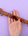 Coucou Suzette Dachshund Ruler - Product shown in models hand