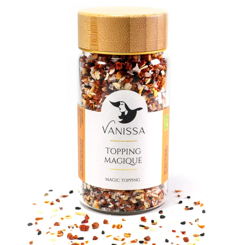 Vanissa Magic Topping - Product shown product sprinkled around bottle