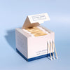 Clean Skin Club Clean Swabs - product shown open with three clean swabs balanced on box