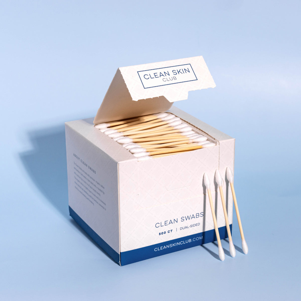 Clean Skin Club Clean Swabs - product shown open with three clean swabs balanced on box
