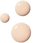 Odacite SPF 50 Flex-Perfecting™ Mineral Drops Tinted Sunscreen - ONE - Product droplets showing color and texture