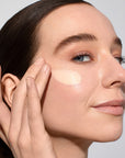 Odacite SPF 50 Flex-Perfecting™ Mineral Drops Tinted Sunscreen - Model shown applying product