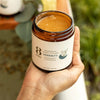8 Days Botanicals Serenity Honey Body Polish - Product shown in models hand