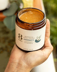8 Days Botanicals Serenity Honey Body Polish - Product shown in models hand