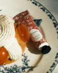 Yolaine La Mousse de Rouge - Praline - Beauty shot - product shown on plate next to dessert