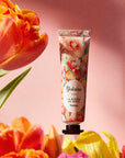 Yolaine La Mousse de Rouge - Tulipe - Beauty shot - product shown with tulips
