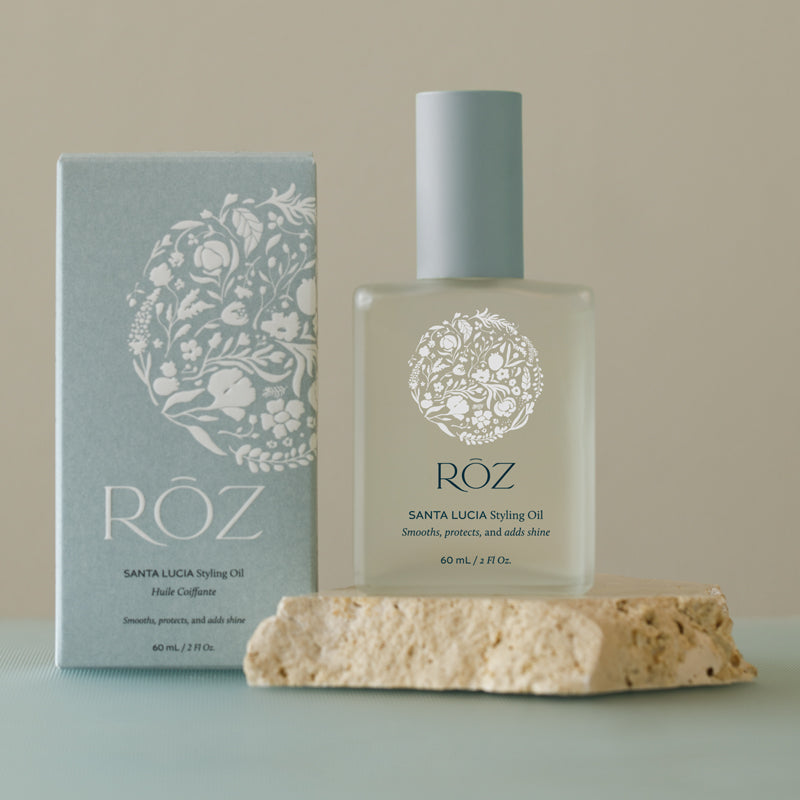 Roz Saint Lucia Styling Oil  - Product shown next to box