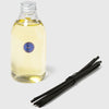 Trudon Home Diffuser Refill Reggio (300 ml)  - Product displayed next to diffuser sticks