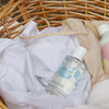 Kerzon Fragranced Mist - Petit Grain (100 ml) - product shown in wicker basket.