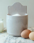 French Dry Goods Kitchen Essentials – Wall Hanging Salt Holder - Product shown with eggs and milk