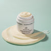 Odacite Edelweiss Extreme™ Intense Repair Eye Cream - close up shot of product with lid off and product smear around jar
