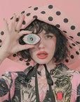 Coucou Suzette Blue Eye Mirror  - Model shown holding product in front of eye
