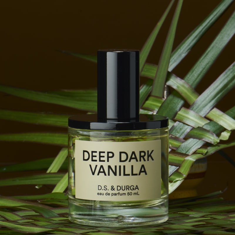 D.S. &amp; Durga Deep Dark Vanilla Eau de Parfum - bottle on palm leaves
