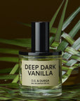 D.S. & Durga Deep Dark Vanilla Eau de Parfum - bottle on palm leaves