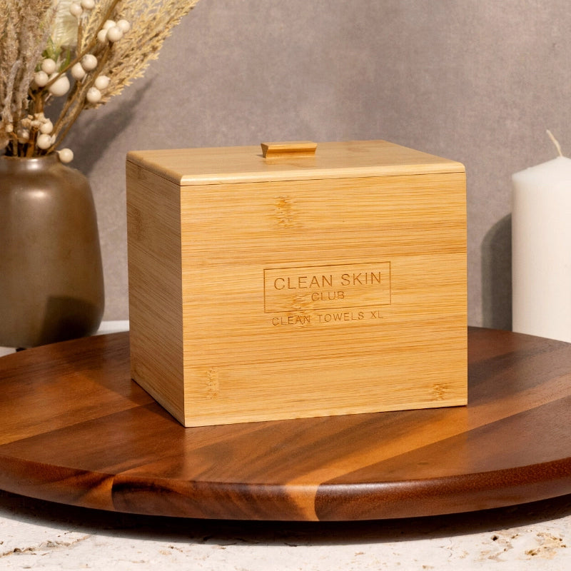 Clean Skin Club Luxe Bamboo Box with Cover - Product displayed on wood table