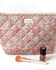 Barnabe Aime Le Cafe Liberty Quilted Toiletry Bag – Alba - Product shown with makeup brush and nail polish