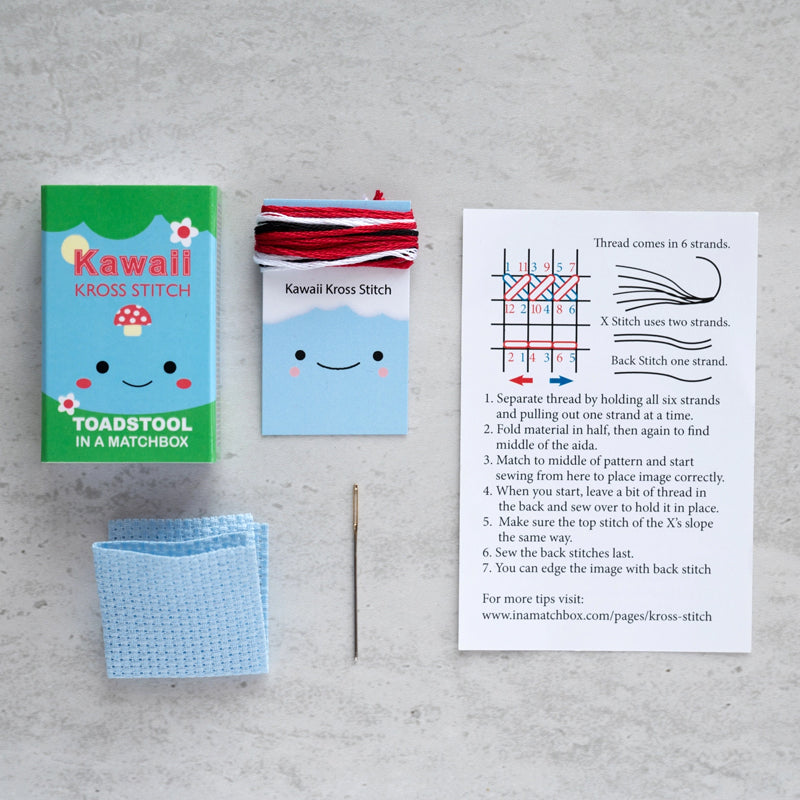 Marvling Bros Ltd Kawaii Toadstool Mini Cross Stitch Kit In A Matchbox- All pieces of product shown on gray background
