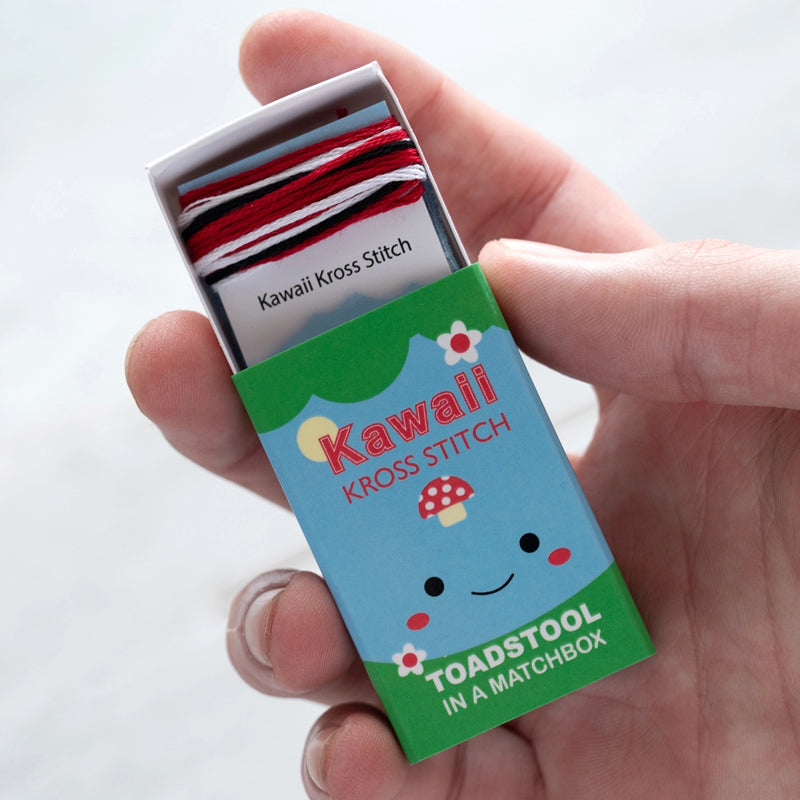 Marvling Bros Ltd Kawaii Toadstool Mini Cross Stitch Kit In A Matchbox- Product shown in models hand